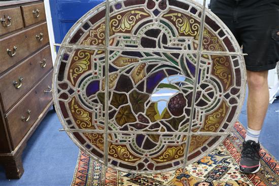 A set of eleven 19th century stained glass roundels, diameter 24in.